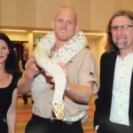 Minnik Integrated Financial Solutions - Australia Zoo - Leah Oliver and Christian Warta with Australia Zoo's favorite python